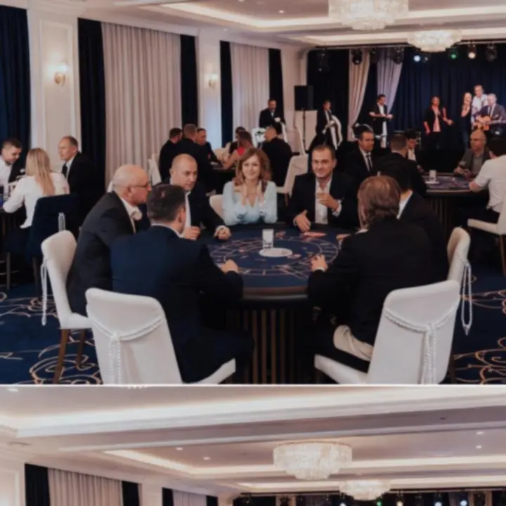 Eleganckie wnętrze eventowe z oświetleniem scenycznym i stołami do gry